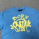 A blue short-sleeved T-shirt with American hip-hop print from a trendy brand