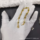 A simple antique golden cross-flower diamond-encrusted thin bracelet